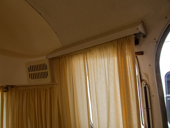 View of the windows forward of the entrance door - 1969 Airstream Tradewind, July 14, 2009