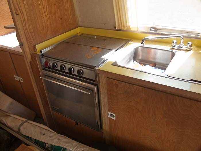View of the gas range and kitchen sink - 1969 Airstream Tradewind, July 14, 2009