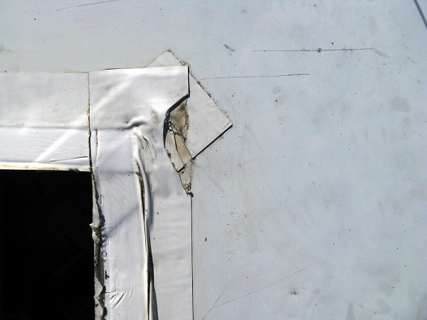 Questionable seal at the left front of the air conditioner opening, Marathon Motel & RV Park, Marathon TX, December 29, 2008 Questionable seal at the left front of the air conditioner opening, Marathon Motel & RV Park, Marathon TX, December 29, 2008