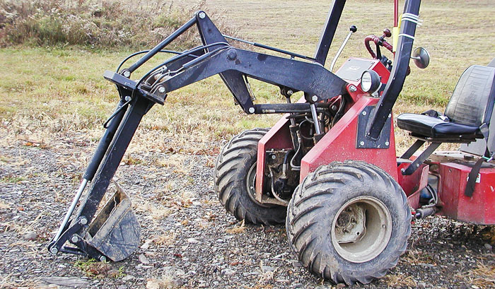 Power-Trac MiniHoe - with bucket curled